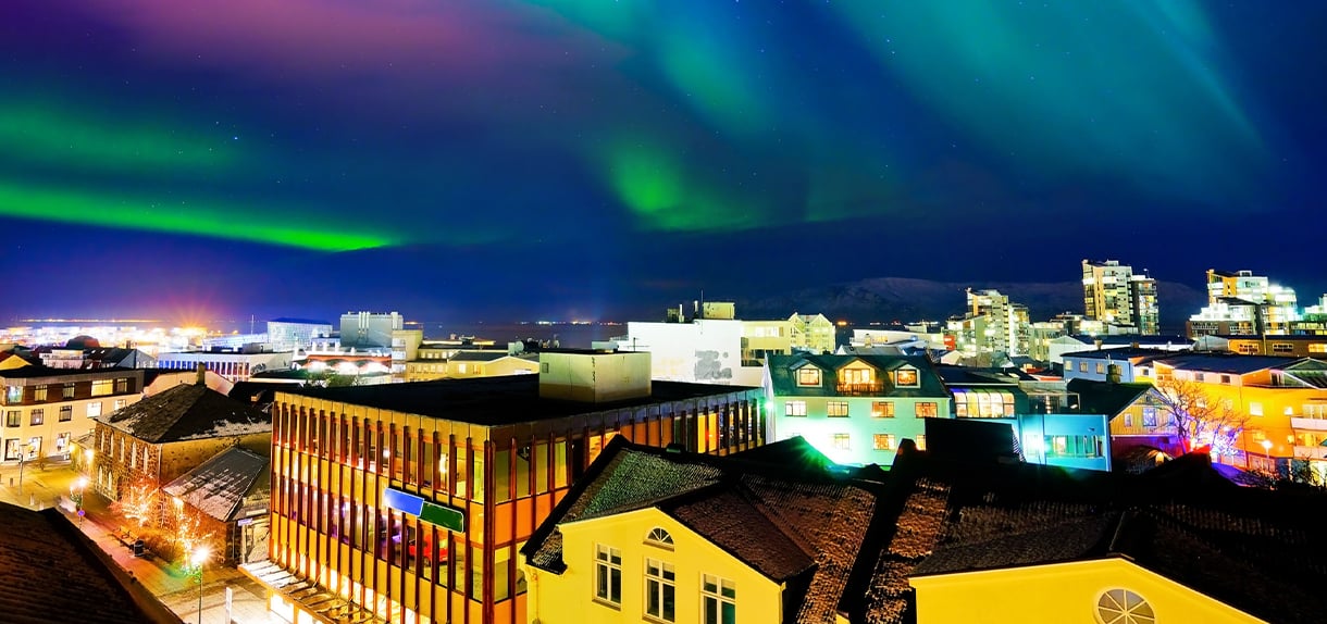 View of the northern light from the city center in Reykjavik, Iceland
