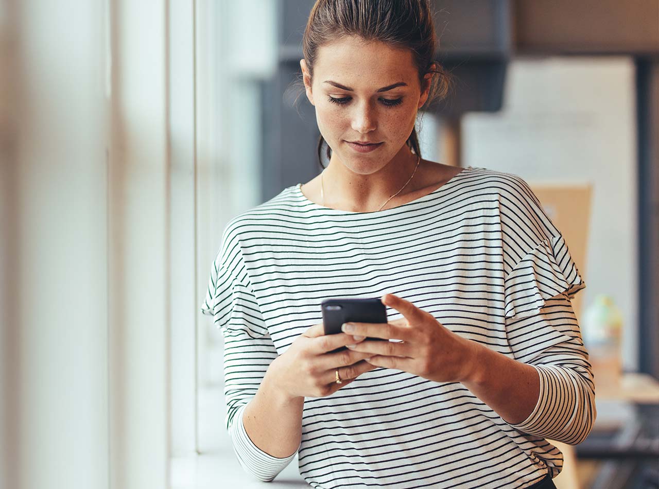 Woman using smartphone